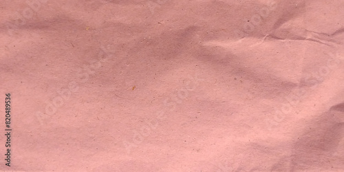 Texture of closed up brown crumpled paper background