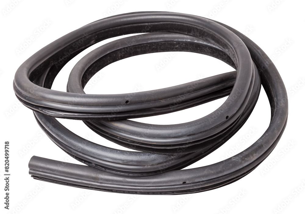 Rolled up black rubber sealant for elements of the car body, doors or trunk, for noise insulation, thermal and sound, preventing heat loss in the car interior. Sealing gasket for repair in a workshop. Rolled up black rubber sealant for elements of the car body, doors or trunk, for noise insulation, thermal and sound, preventing heat loss in the car interior. Sealing gasket for repair in a workshop.