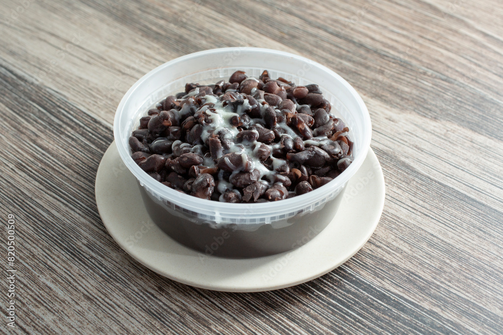 A view of a container black beans. A view of a container black beans.