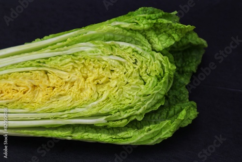 Fresh chicory or Brassica pekinensis L close up, on dark background. photo