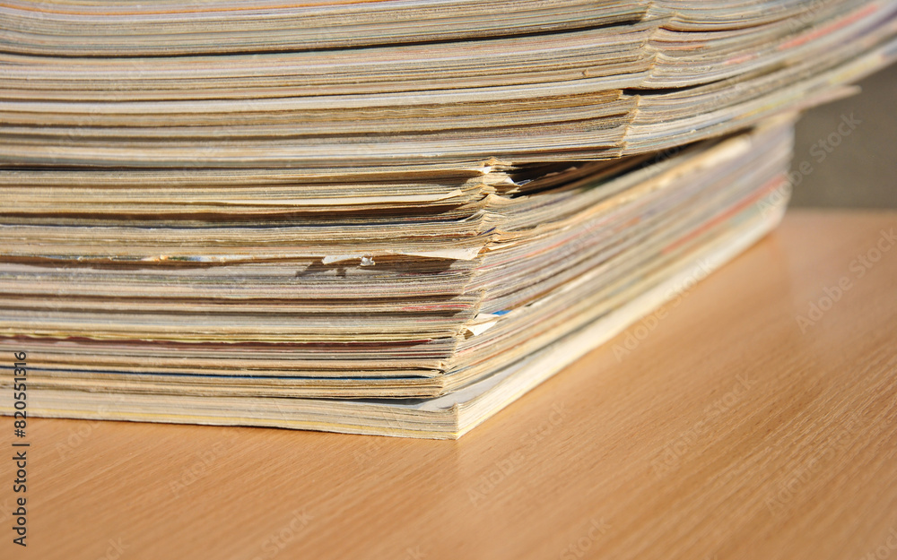 stack of magazines on the table close-up. selective focus stack of magazines on the table close-up. selective focus