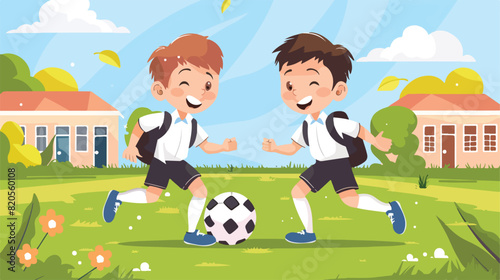 Pair of boys dressed in school uniform playing footba