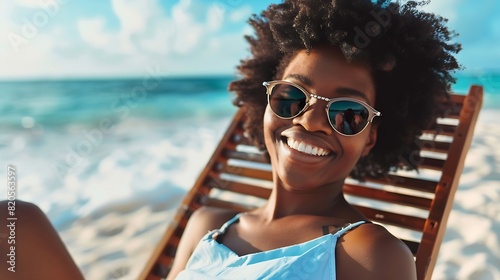 Portrait of happy young black woman relaxing on wooden deck chair at tropical beach while looking at camera wearing spectacles Smiling african american girl with fashion sunglasses enj : Generative AI photo