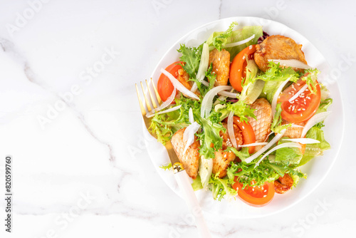 Vegetable salad with grilled chicken photo