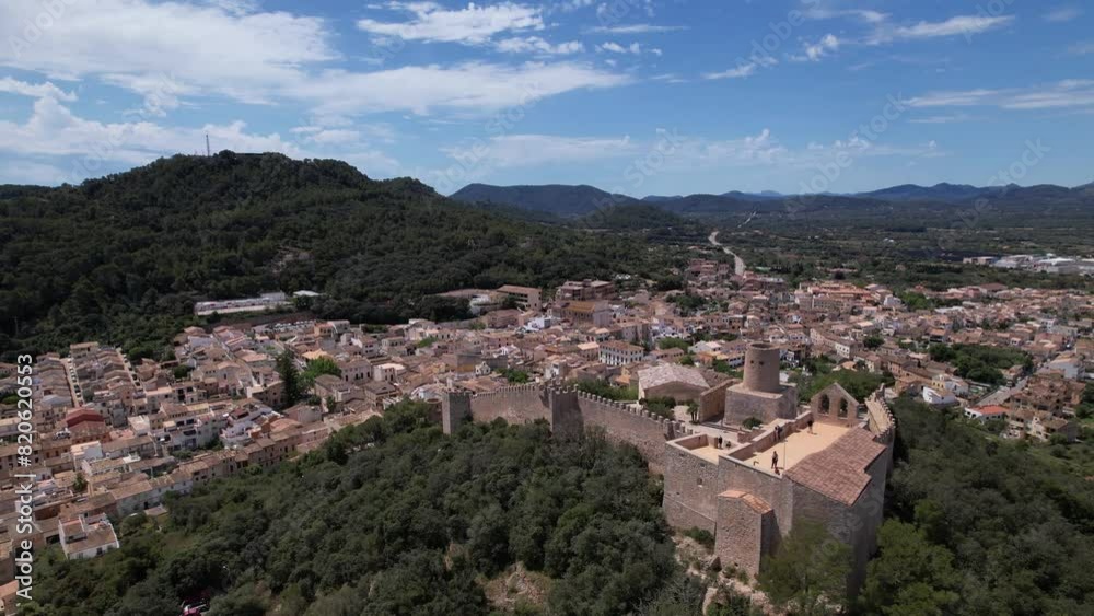 Aerial View of Capdepera City With Mountains in Background Aerial View of Capdepera City With Mountains in Background