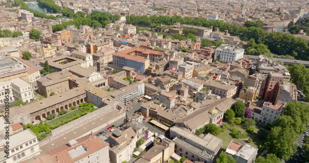 Aerial view of houses and buildings in the Trastevere district in Rome, Italy. It is one of the most touristy districts in the historic center of the Italian capital. Aerial view of houses and buildings in the Trastevere district in Rome, Italy. It is one of the most touristy districts in the historic center of the Italian capital.