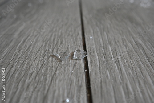 shards of broken crockery on the grey floor, broken crockery on the floor