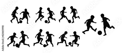 Boys playing soccer or football together, young soccer players playing with ball silhouette, boys soccer players silhouette