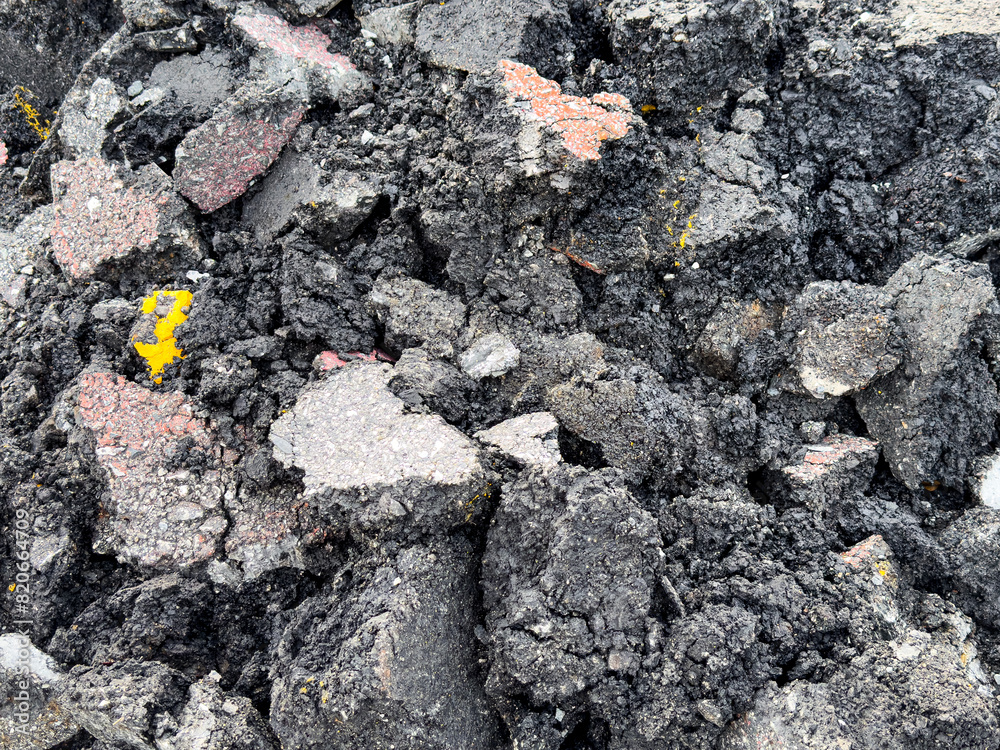 Pile of old cracked asphalt rubble close up, abstract industrial background. Pile of old cracked asphalt rubble close up, abstract industrial background.