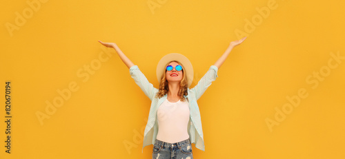 Summer holidays, inspired happy smiling young woman raising hands up on colorful yellow background