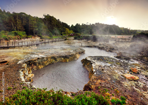 Azores - Furnas, Sunset volcano  landscpae over lake with hot spring and fumarol. photo