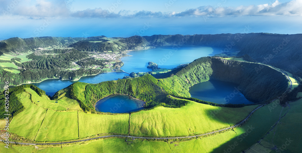Fototapeta premium Landscape Panorama drone picture from Volcano to the rainforest with lake and wood, Azores, San Miguel, Portugal