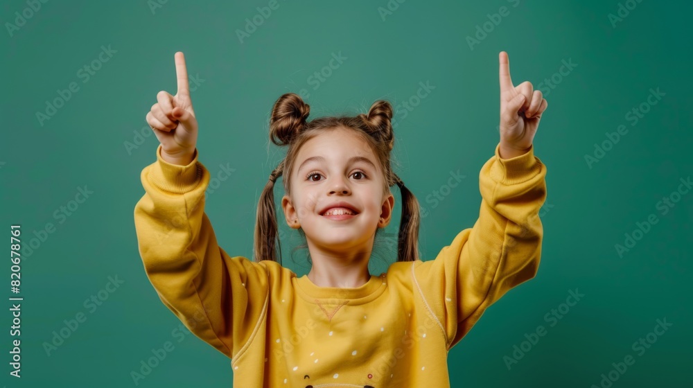 Smiling Girl Pointing Upwards Smiling Girl Pointing Upwards