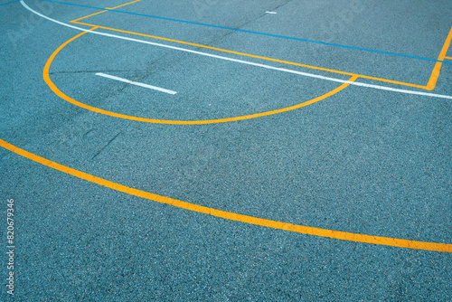 Outdoor basketball court lines and markings on concrete flooring  street ball abstract background