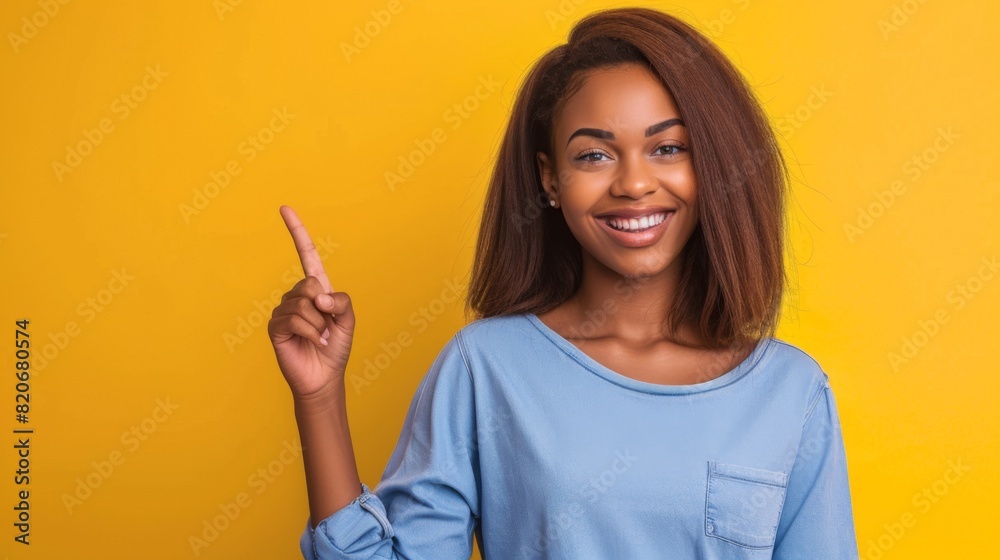 Confident Woman Pointing Upward Confident Woman Pointing Upward