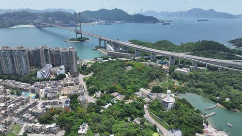 Ma Wan Park Island with beach resort clubhouse in Lantau Island Tsuen Wan Tsing Yi Hong Kong near Tsing Ma Bridge and Kap Shui Mun Bridge,Aerial skyview photo