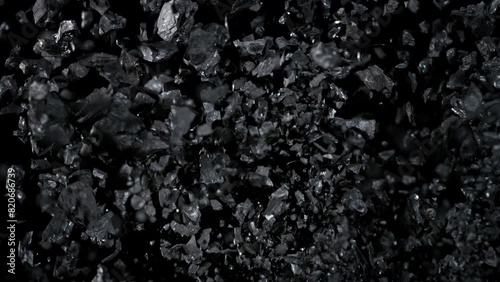 Super Slow Motion Shot of Flying Coal Pieces at 1000 fps.