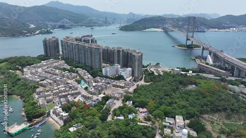 Ma Wan Park Island with beach resort clubhouse in Lantau Island Tsuen Wan Tsing Yi Hong Kong near Tsing Ma Bridge and Kap Shui Mun Bridge,Aerial skyview photo