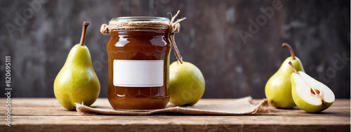 A jar of pear jam and fresh fruits on a wooden table. Place for text. Glass jar of pear jam with blank label for adding reflected text. Jam jar mockup, jar tag for text and logo.