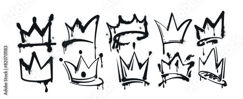 Vector spray paint graffiti crowns set. Black painted ink king, queen or prince crown isolated on white background. Hand drawn princess tiara. Grunge airbrush street art, inky royal logo with splashes