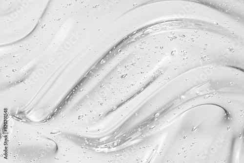Gel texture. Clear liquid cosmetic background. Skincare serum, beauty cream with bubbles closeup