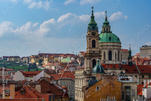 Wallpaper Mural Church of St. Nicholas (built 1732-1737) against the backdrop of the roofs of the capital of the Czech Republic - the city of Prague Torontodigital.ca