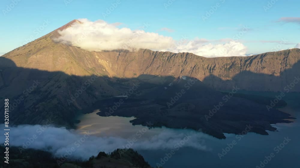 Mount Rinjani at beautiful sunset, the second highest volcano in Indonesia Mount Rinjani at beautiful sunset, the second highest volcano in Indonesia