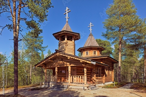 Wooden Nellim orthodox church in clear spring weather, Nellim, Lapland, Finland.