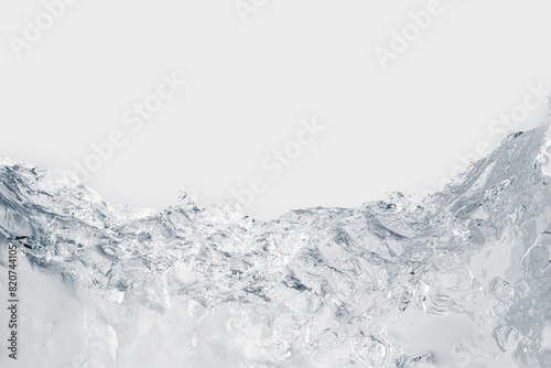 Pure transparent crushed ice piece on a white background.