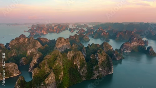 Hyperlapse of Sunset in Halong Bay, Vietnam, Southeast Asia. UNESCO World Heritage Site photo