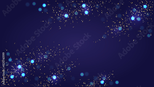 Gold sequins and bokeh on navy background. Festive background