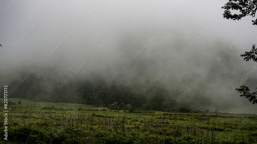 Mountain surrounded by fog in northern Spain Mountain surrounded by fog in northern Spain