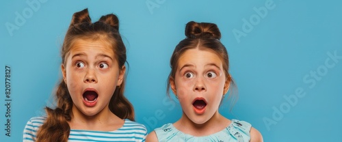 Delve Into Emotions With A Close-Up Portrait Of Two Nice, Cute, And Charming Pre-Teen Girls Showing Expressions Of Shock And Fear
