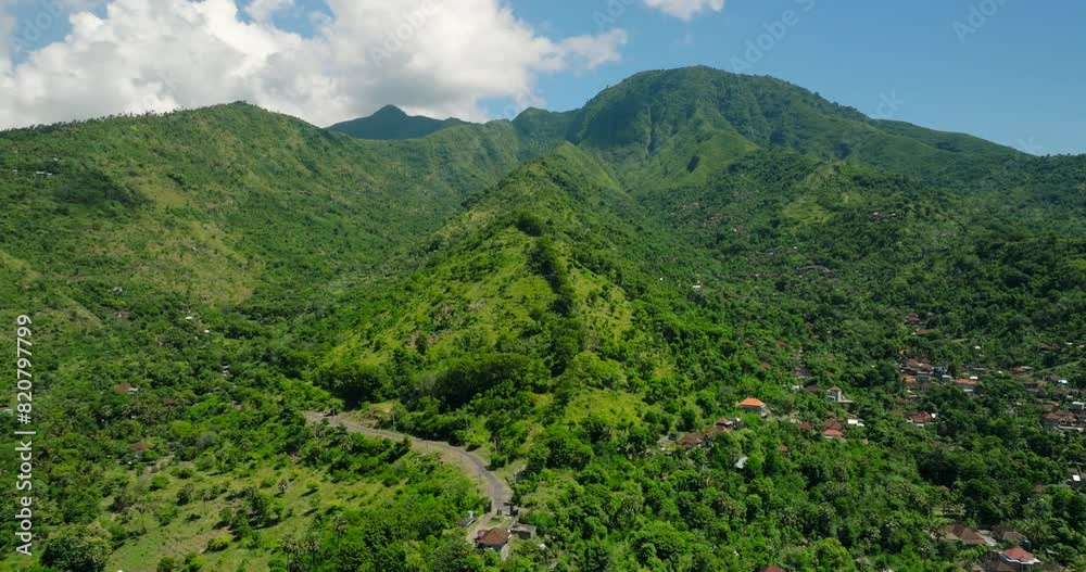 A breathtaking aerial video showcasing a lush green mountain valley in Bali A breathtaking aerial video showcasing a lush green mountain valley in Bali