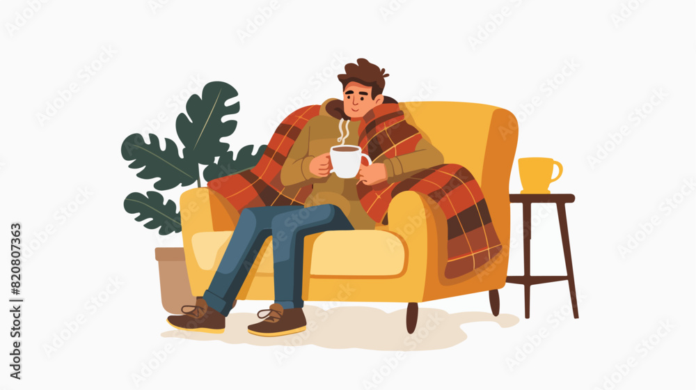 Happy person relaxing at home sitting on sofa warming