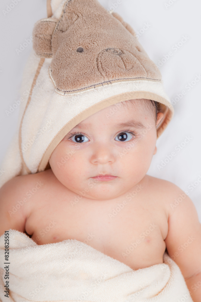 adorable baby lying in blanket and looking up to us adorable baby lying in blanket and looking up to us