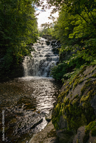 Woodland waterfall on the Ilabekken river by the city of Trondheim, Norway photo