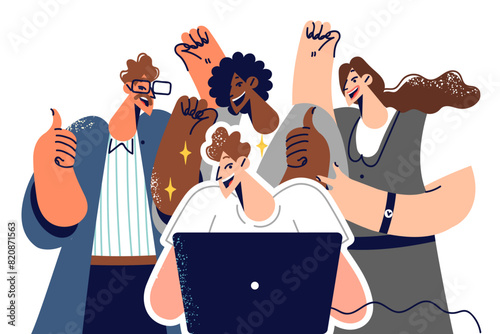 Overjoyed business people from different countries celebrating looking at laptop