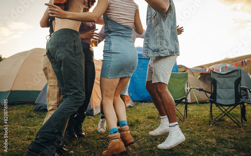 Youngsters dancing and enjoying every moment at a vibrant music festival photo