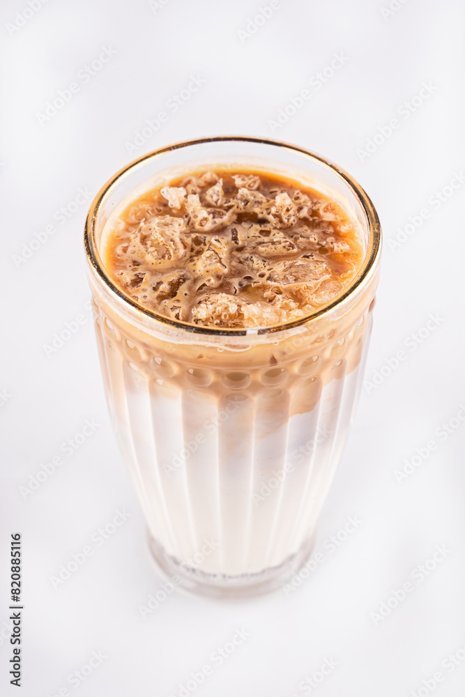 coffee with ice and milk on white background coffee with ice and milk on white background