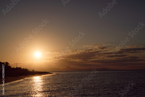 Sunset on Les Bovetes beach, near Denia. Alicante. Valencian Community. Spain