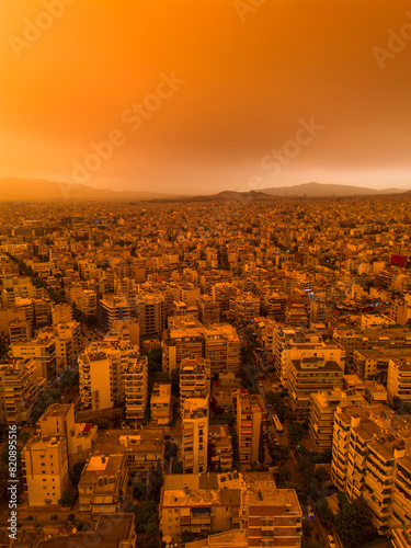 Athens,Greece,April 23,2024.Dust from Africa covers everything.View from a drone at sunset ,Palio Faliro,Greece