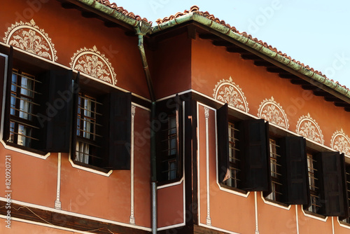 Decorated windows on the facade of the Balabanov House, an example of National Revival Architecture in the old town of Plovdiv, Plowdiw, Bulgaria photo