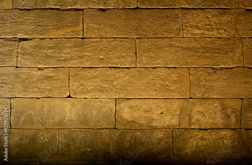 A sunk-relief depiction of a caravan of dromedaries on the north facade of the Temple of Debod. Madrid, Spain. photo