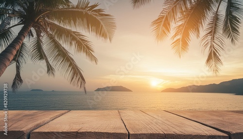 wooden table and tropical palm tree and sea sunset summer background