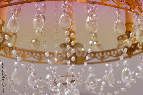A beautiful chandelier decorated with clear crystals.