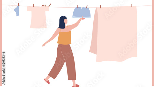 The girl is drying the clothes.