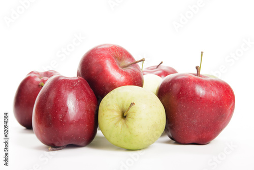 Assorted Fresh Red and Green Apples on a White Background During Daylight