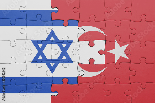 Fototapeta Naklejka Na Ścianę i Meble -  puzzle with the colourful national flag of turkey and flag of israel.