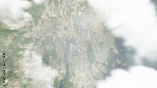 Earth zoom in from space to Tonsberg, Norway. Followed by zoom out through clouds and atmosphere into space. Satellite view. Travel intro. Images from NASA photo